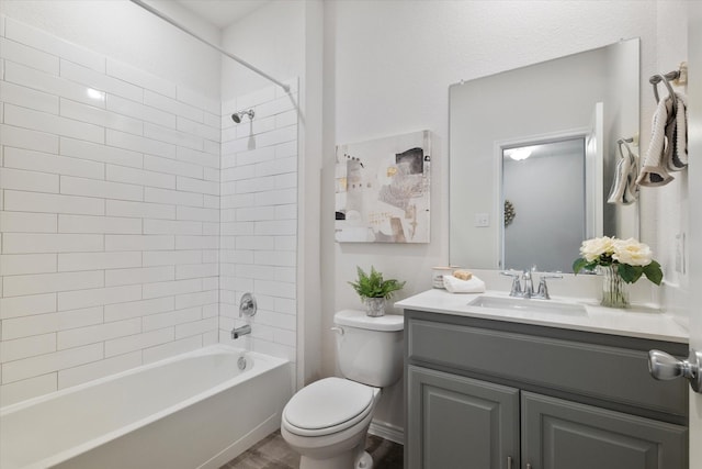1008 Sublime Dr, Heath, TX 75126 - full bathroom with toilet, washtub / shower combination, wood finished floors, and vanity