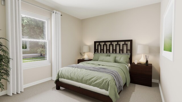 carpeted bedroom featuring baseboards