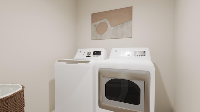 laundry area featuring laundry area and washer and dryer