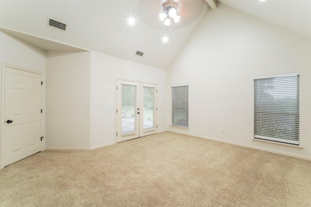 empty room featuring ceiling fan, french doors, high vaulted ceiling, baseboards, and carpet
