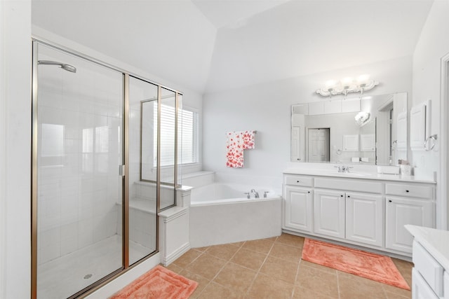 full bathroom featuring a bath, tile patterned flooring, a shower stall, vanity, and high vaulted ceiling