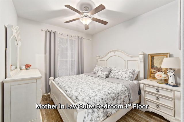 bedroom featuring dark wood-type flooring and ceiling fan