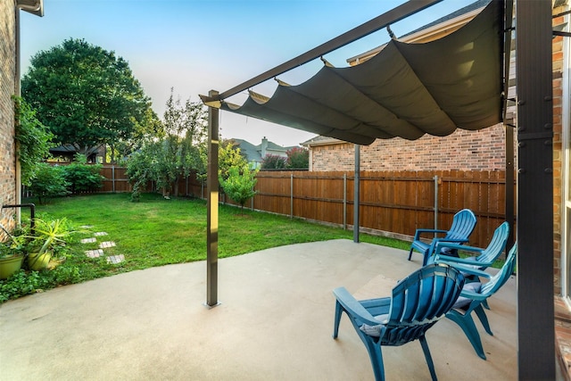 view of patio / terrace featuring a pergola and a fenced backyard