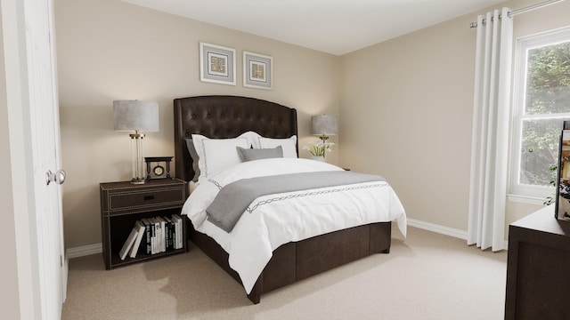 bedroom featuring carpet floors and baseboards