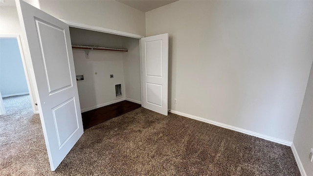 laundry room featuring hookup for an electric dryer, laundry area, baseboards, hookup for a washing machine, and carpet flooring