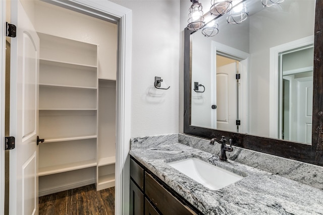 580 Leatherwood Ln, Poolville, TX 76487 - bathroom featuring wood finished floors and vanity