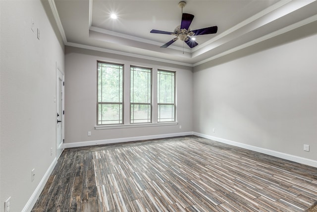 580 Leatherwood Ln, Poolville, TX 76487 - unfurnished room with dark wood-type flooring, ornamental molding, a raised ceiling, and baseboards