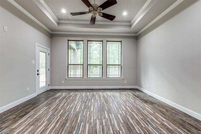 580 Leatherwood Ln, Poolville, TX 76487 - spare room featuring crown molding, dark wood finished floors, and a raised ceiling