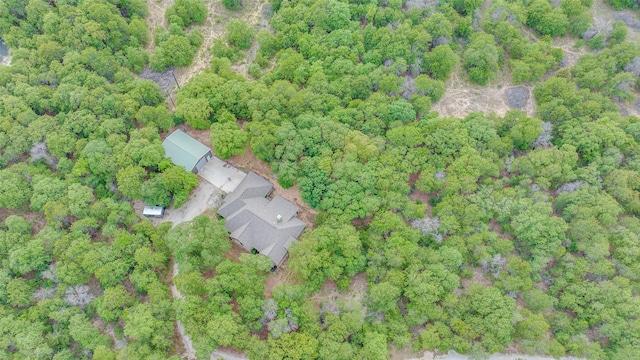 580 Leatherwood Ln, Poolville, TX 76487 - drone / aerial view with a wooded view