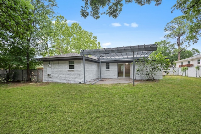 rear view of property with a lawn, a fenced backyard, a patio area, and a pergola