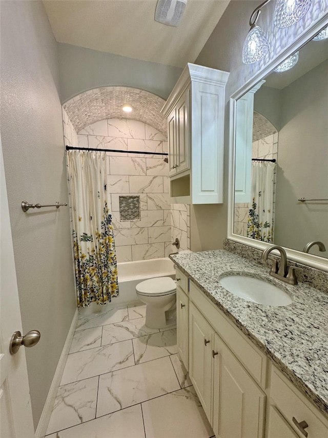 full bathroom with vanity, toilet, shower / bathtub combination with curtain, marble finish floor, and baseboards