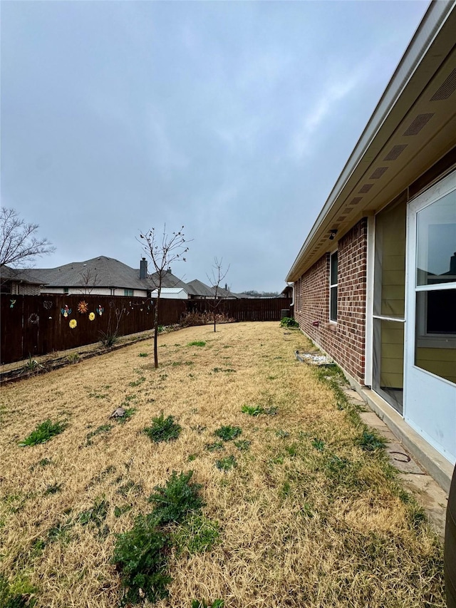 view of yard featuring a fenced backyard
