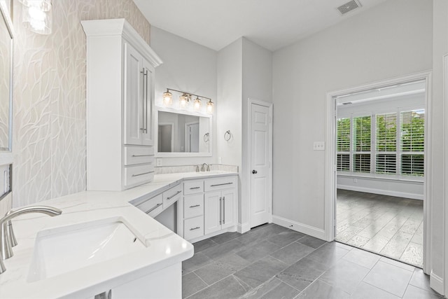 821 High Willow Dr, Prosper, TX 75078 - full bathroom featuring visible vents, a sink, baseboards, and double vanity