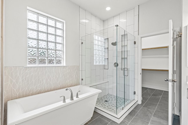 821 High Willow Dr, Prosper, TX 75078 - bathroom featuring recessed lighting, a walk in closet, a shower stall, and a soaking tub