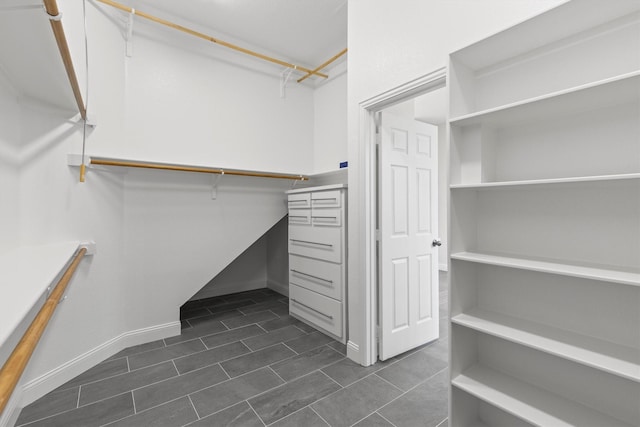 821 High Willow Dr, Prosper, TX 75078 - walk in closet with dark tile patterned flooring