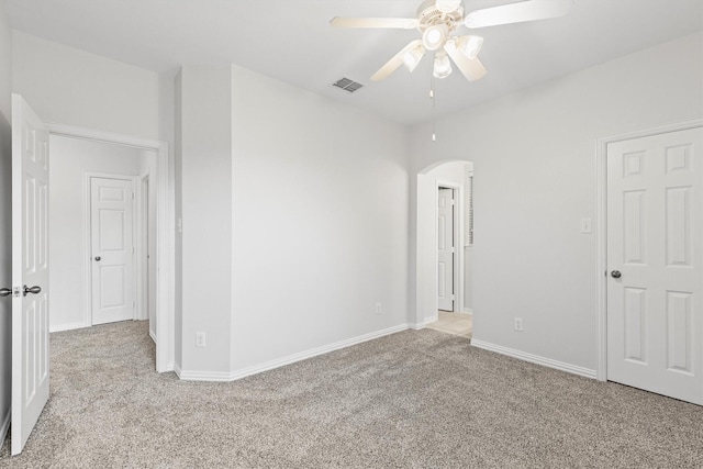 821 High Willow Dr, Prosper, TX 75078 - unfurnished bedroom featuring arched walkways, baseboards, visible vents, and carpet
