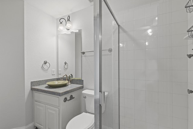 821 High Willow Dr, Prosper, TX 75078 - bathroom with vanity, toilet, and a stall shower