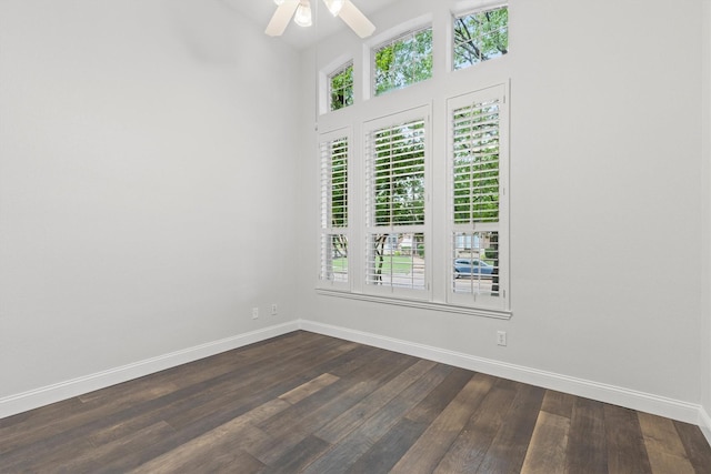 821 High Willow Dr, Prosper, TX 75078 - spare room featuring a healthy amount of sunlight, baseboards, a ceiling fan, and dark wood finished floors