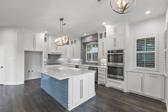 821 High Willow Dr, Prosper, TX 75078 - kitchen featuring white cabinets, appliances with stainless steel finishes, a notable chandelier, and dark wood-type flooring