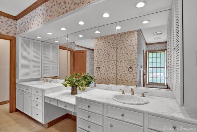full bath with vanity, recessed lighting, wallpapered walls, baseboards, and ornamental molding