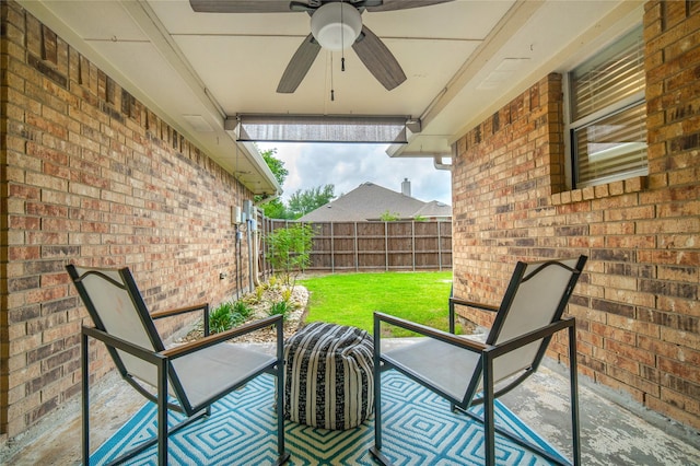 view of patio / terrace with ceiling fan and a fenced backyard