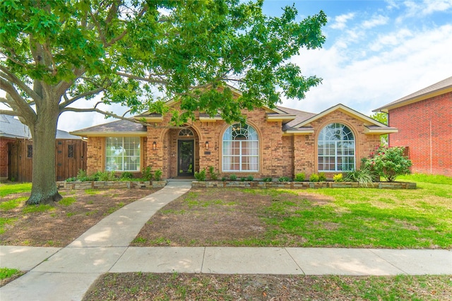 view of front of property with brick siding