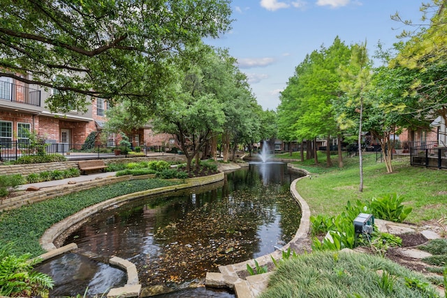 surrounding community featuring a yard and fence