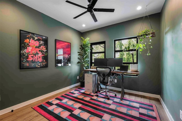 office space featuring baseboards, recessed lighting, ceiling fan, and wood finished floors