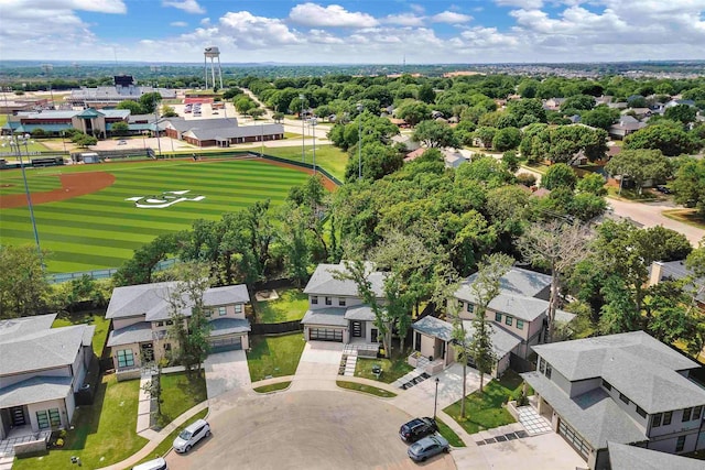 birds eye view of property with a residential view