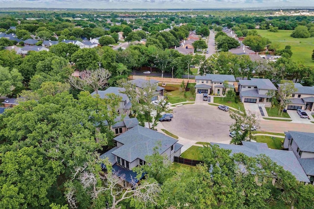 birds eye view of property with a residential view