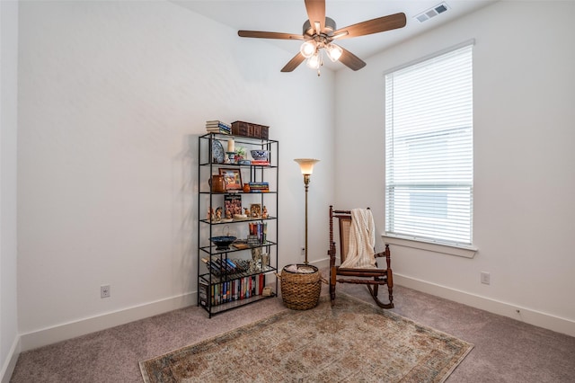 1130 Holcombe Dr, Anna, TX 75409 - living area with a healthy amount of sunlight, carpet floors, ceiling fan, and visible vents