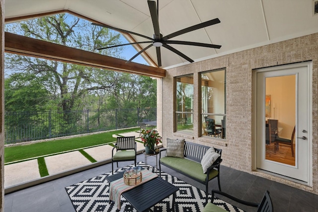 sunroom with visible vents, ceiling fan, and outdoor lounge area