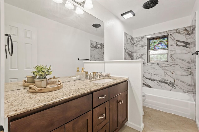 bathroom with vanity, tile patterned flooring, shower / bathtub combination, and toilet