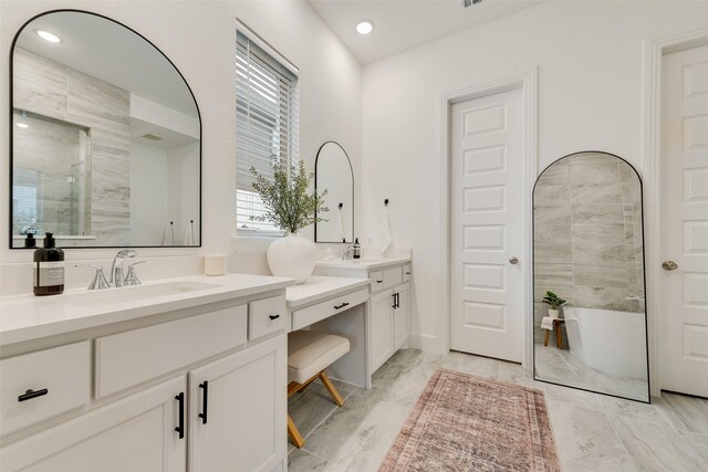 1719 Godello Dr, Mclendon Chisholm, TX 75032 - bathroom with a tile shower, vanity, marble finish floor, recessed lighting, and a freestanding tub