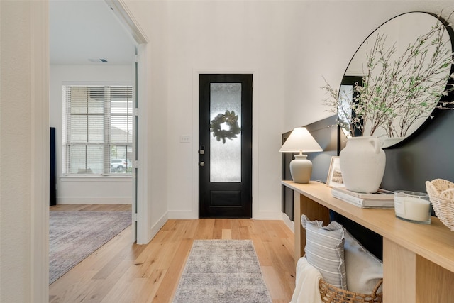 1719 Godello Dr, Mclendon Chisholm, TX 75032 - entryway featuring baseboards, wood finished floors, and visible vents