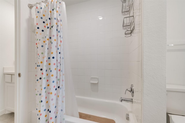 1719 Godello Dr, Mclendon Chisholm, TX 75032 - bathroom featuring shower / bath combo with shower curtain and toilet