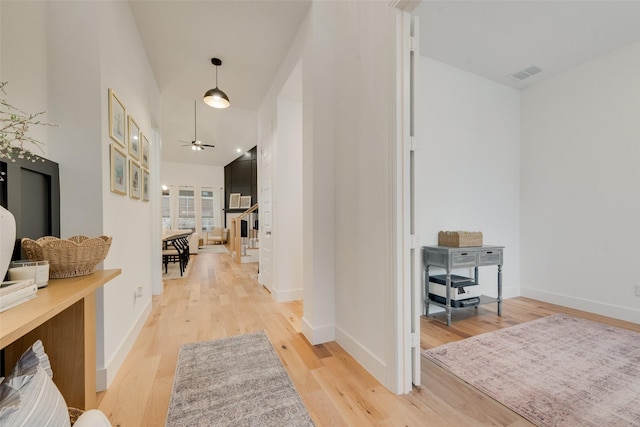 1719 Godello Dr, Mclendon Chisholm, TX 75032 - hallway with light wood-style floors, baseboards, and visible vents