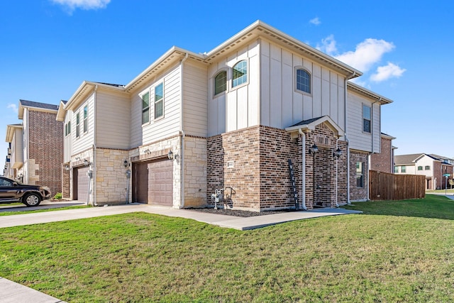 4603 Amal Saleh Dr, Irving, TX 75061 - view of front of property with fence, an attached garage, board and batten siding, a front yard, and concrete driveway