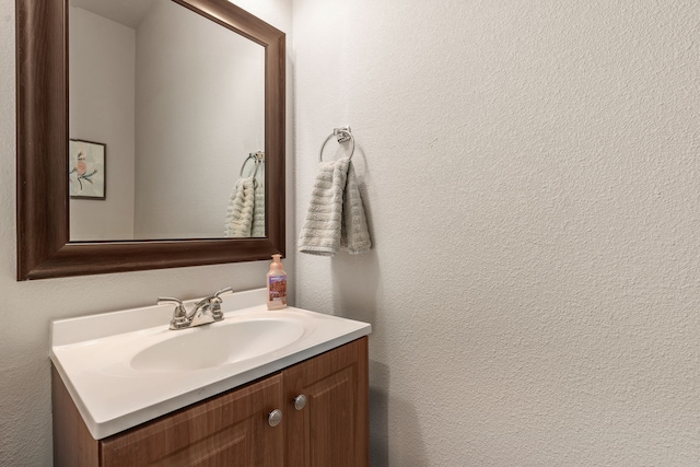 4603 Amal Saleh Dr, Irving, TX 75061 - bathroom featuring a textured wall and vanity
