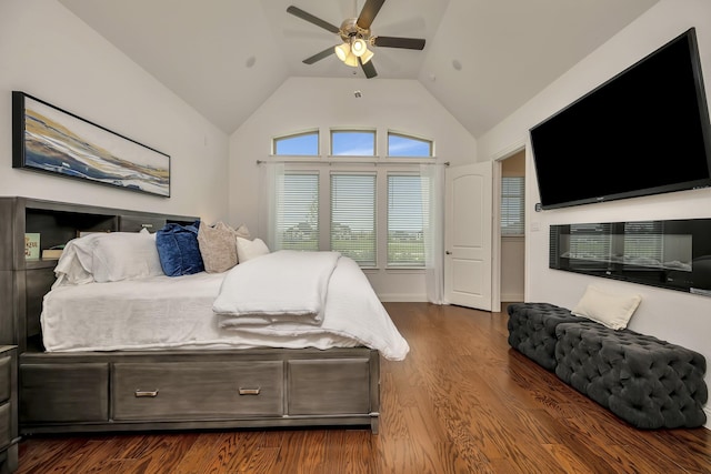 2203 Miranda Ln, Rockwall, TX 75087 - bedroom featuring dark wood-type flooring, vaulted ceiling, and ceiling fan