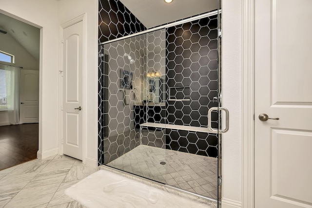 bathroom featuring recessed lighting, marble finish floor, baseboards, and a shower stall