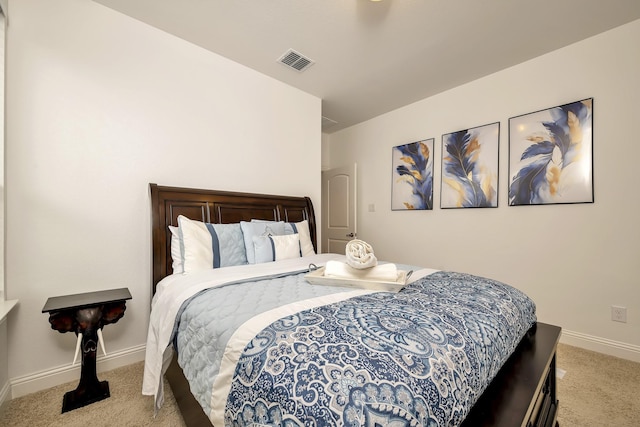 bedroom with visible vents, baseboards, and carpet floors
