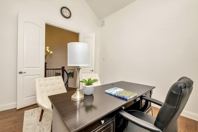 home office with baseboards, vaulted ceiling, dark wood-style flooring, and visible vents