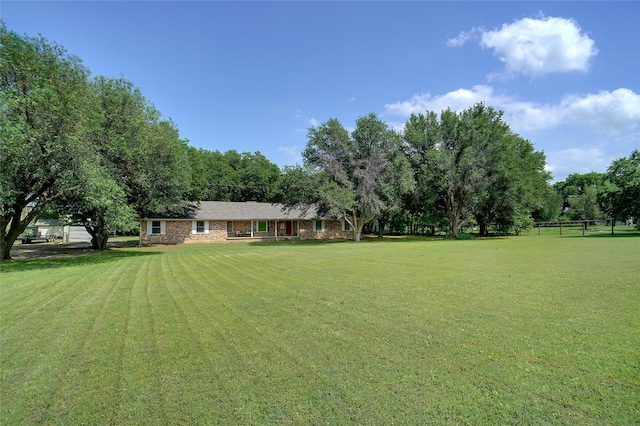 view of yard with fence