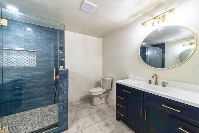 3701 Lamesa Dr, Garland, TX 75041 - bathroom featuring marble look tile flooring, toilet, a stall shower, vanity, and baseboards