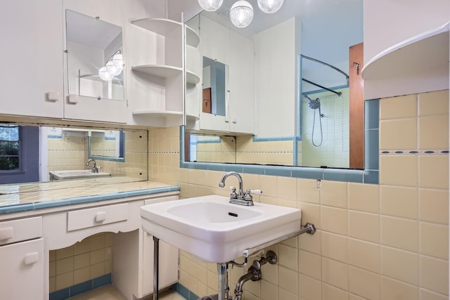full bathroom with decorative backsplash, tile walls, and tiled shower