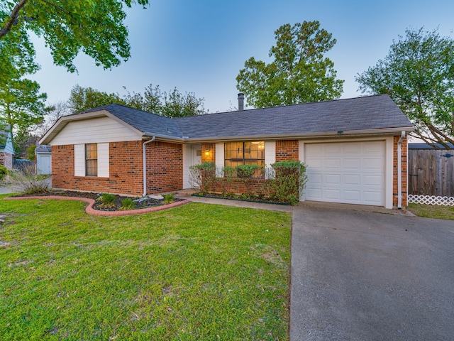 5005 Drew Ct, Arlington, TX 76017 - ranch-style home with brick siding, a garage, a front lawn, and driveway