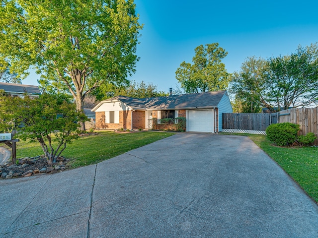 5005 Drew Ct, Arlington, TX 76017 - single story home featuring fence, brick siding, a garage, a front yard, and concrete driveway