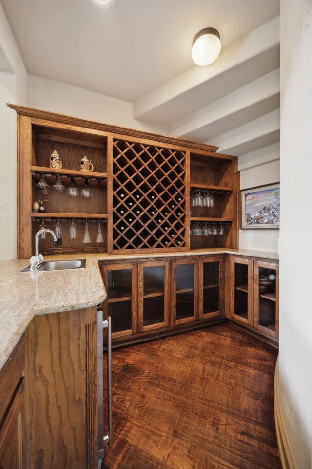 1041 Bandelier Dr, Allen, TX 75013 - hall with stairway, plenty of natural light, a sink, and dark wood finished floors