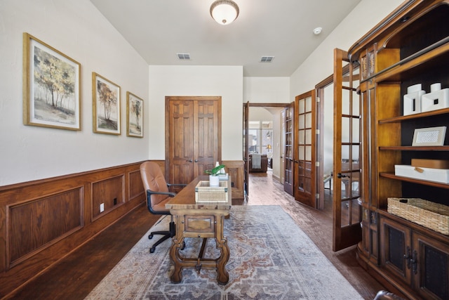 1041 Bandelier Dr, Allen, TX 75013 - office area with french doors, dark wood-type flooring, and a wainscoted wall